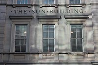 View of The Sun Building name on Broadway