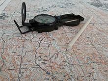 A compass and map Compass and map.jpg