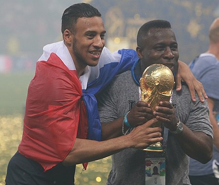 Fail:Corentin_Tolisso_World_Cup_Trophy.jpg