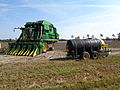 Cotton picker and farm equipment, Brooks County cotton field.JPG