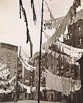 Tenement houses in 1936 Court of first model tenement house in New York, 72nd Street and First Avenue, Manhattan (NYPL b13668355-482804).jpg