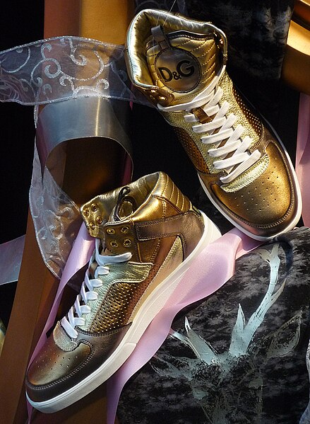 A pair of Dolce & Gabbana's Golden Sneakers