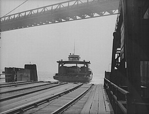 Loaded train ferry approaches dock in Detroit, Michigan, United States in April 1943.