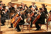 The cello section of the orchestra of the Munich University of Applied Sciences is shown here.