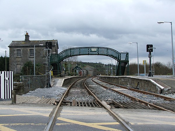 Railway tracks stretch into the distance towards Killarney from the level crossing at the eastern end of Farranfore station