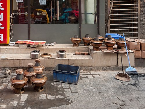 Ho pots in front of a restaurant in Beijing