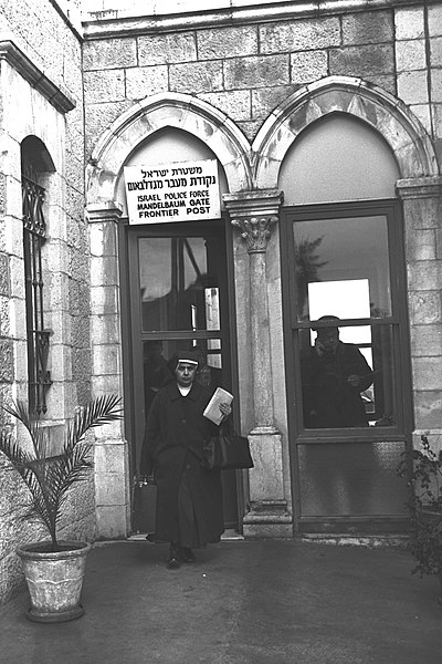 File:Flickr - Government Press Office (GPO) - A nun leaving the Mandelbaum gate.jpg