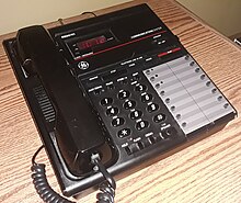 A General Electric corded telephone with a built-in microcassette answering machine