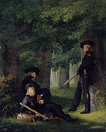 Heinrich Hartmann (lying, left) Theodor Körner (sitting, middle) and Friedrich Friesen (standing, right) at a forward post, by Georg Friedrich Kersting (1815). All three are wearing the uniform of the Jäger and the Iron Cross, 2nd Class. (Source: Wikimedia)