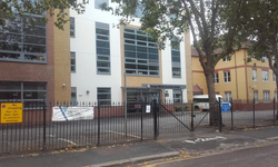 George Mitchell School from Farmer Road b.png