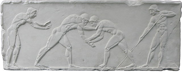 Wrestlers shown in the center on an Ancient Greek relief of the pentathlon, c. 500 BC.