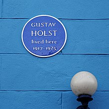 Gustav Holst lived in Thaxted from 1917 to 1925 Gustav Holst blue plaque Thaxted Essex England.jpg