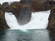 The waters of Fossá merging in the basin of Hjálparfoss.