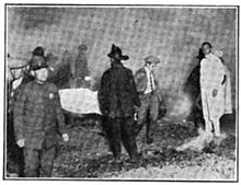 Firefighters remove bodies from the site of the Hope Development School fire Hope Developmental School fire 1924.jpg