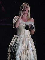 Clarkson performing the song wearing the wedding dress featured in its music video Kelly Clarkson in Canberra, 2005 (2).jpg