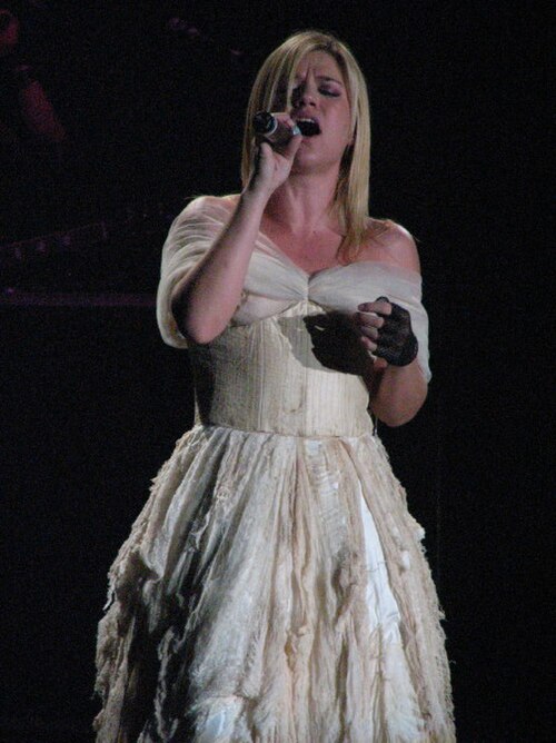 Clarkson performing the song wearing the wedding dress featured in its music video
