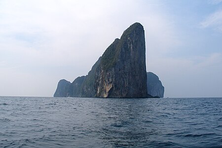 Ko Phi Phi Leh definitive vertical limestone cliff as seen from the water, Thailand.jpg