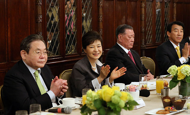 South Korean President Park Geun-hye at a breakfast meeting with business magnates Lee Kun-hee and Chung Mong-koo
