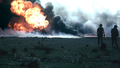 Kuwaiti oil wells on fire, during the Gulf War.