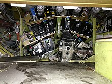 NTSB file photo, showing the extent of the damage to the electronics bay, with the collapsed nose gear jammed into it, only the right axle attached Landing gear of Southwest Airlines Flight 345.jpg