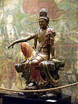 Guanyin of the Southern Seas; 11th-12th century; painted and gilded wood; height: 2.41 m; Nelson-Atkins Museum of Art (Kansas City, Missouri, USA)[98]