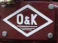 O&K-Logo am Motor