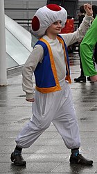 MCM 2013 - Toad, Luigi & Mario (8978170431) (cropped, Toad).jpg