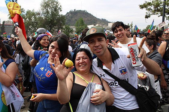 Protestors with Football shirts of rival teams in Plaza Italia, Santiago de Chile, in 2019 Chilean protests.