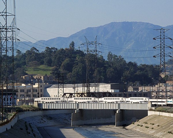 Los Angeles River today, looking north in the area where Portolá crossed. The green hill in the mid-distance is Elysian Park, where California Histori