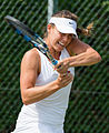 Michelle Larcher de Brito competing in the second round of the 2015 Wimbledon Qualifying Tournament at the Bank of England Sports Grounds in Roehampton, England. The winners of three rounds of competition qualify for the main draw of Wimbledon the following week.