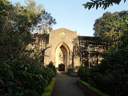 The university's administration building with the Bombay Stock Exchange in the background