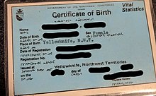 A short-form Northwest Territories certificate of birth (in card format), bearing the Inuktitut language NWT Short-form Birth Registration Card.jpg