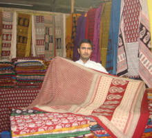 A traditional Bagh Print craftsman from Bagh, Madhya Pradesh Nature Bazar presents Dastkar Design Fair 2015.png