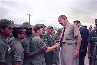 President Johnson shakes hands with U.S. soldiers at Cam Ranh Bay in South Vietnam, c. October 1966 OCTOBER 1966 - PRESIDENT JOHNSON VISITS U.S. SOLDIERS AT CAM RANH BAY IN SOUTH VIETNAM.jpg