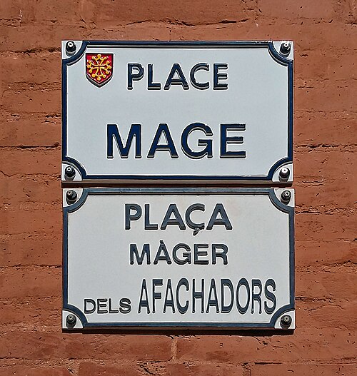 This bilingual street sign in Toulouse, like many such signs found in Toulouse's historical districts, is maintained primarily for its antique charm, 