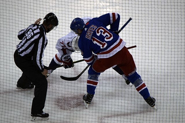 Hayes taking a faceoff in 2017