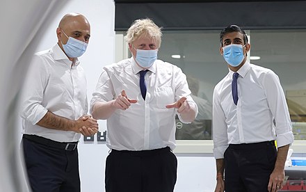 Sunak (right) and Sajid Javid (left) (the first two cabinet members to resign on 5 July) pictured with Johnson (centre)