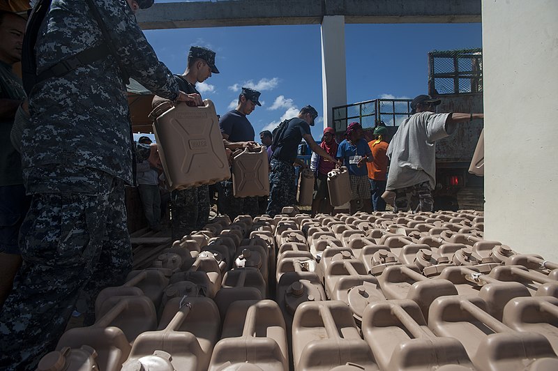 File:Sailors prepare to distribute water. (10876223863).jpg