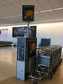 A Smarte Carte luggage cart stand at San Jose International Airport Smarte Carte stand SJC 2019.jpg