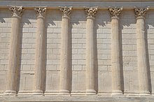 Engaged columns embedded in a side wall of the cella of the Maison Carree, Nimes, France, unknown architect, 2nd century The Maison Carree, 1st century BCE Corinthian temple commissioned by Marcus Agrippa, Nemausus (Nimes, France) (14562056828).jpg