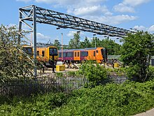 Class 730 unit alongside two Class 323 units at Soho Depot. Trains at Soho EMU Depot, Birmingham.jpg