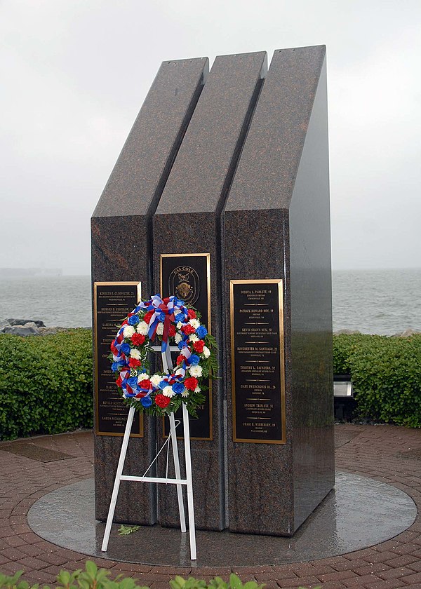 A wreath laid by the crew of USS Cole at the Norfolk Naval Station memorial, 12 October 2001.