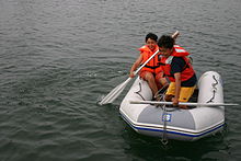 Inflatable dinghy Using the dinghy in Quissett.jpg