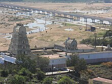 Aerial view of the Venkatesa Perumal Temple in Thirumukkudal (near Kanchipuram), a temple built by Virarajendra in 1069. The temple also included a hospital and Vedic schools. Venkatesa Perumal Temple at Tirumukkoodal (Pazhayaseevaram) near Kanchipuram - top view.jpeg