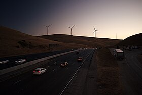 Views of windmills and pasture land at sunset at Altamont Pass Wind Farm 05.jpg