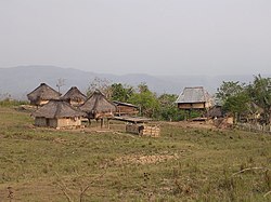 Village huts near Iliomar on the Iliomar-Uatu kerbau road, Lautem, 8 Apr 2003.jpg