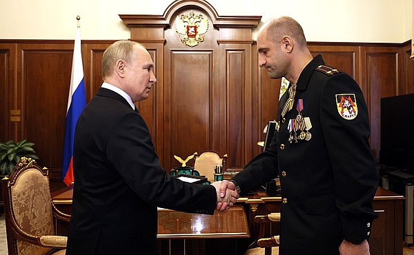 Vladimir Putin and Artem Zhoga on 9 May 2022