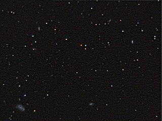 Amateuraufnahme des Sternfelds mit Wolf 359 (der auffallend rote Stern etwas oberhalb der Bildmitte)