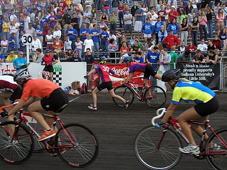 Rider exchange at the 2004 Women's Little 500. Teams must make several exchanges during the race. WomensLittle5RiderChange.jpg