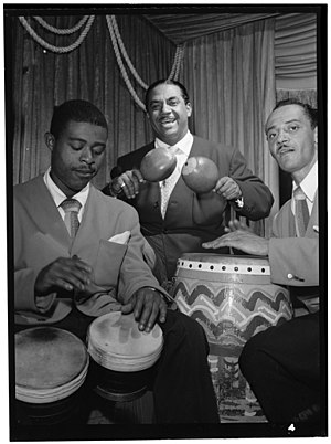 Jose Mangual, Sr. on bongos (left) alongside Machito on maracas and Carlos Vidal on conga at the Glen Island Casino, New York, 1947